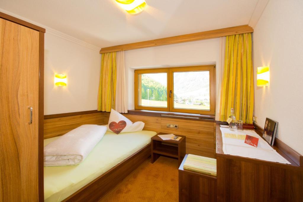 Hotel Garni Hainbacherhof Зёльден Номер фото